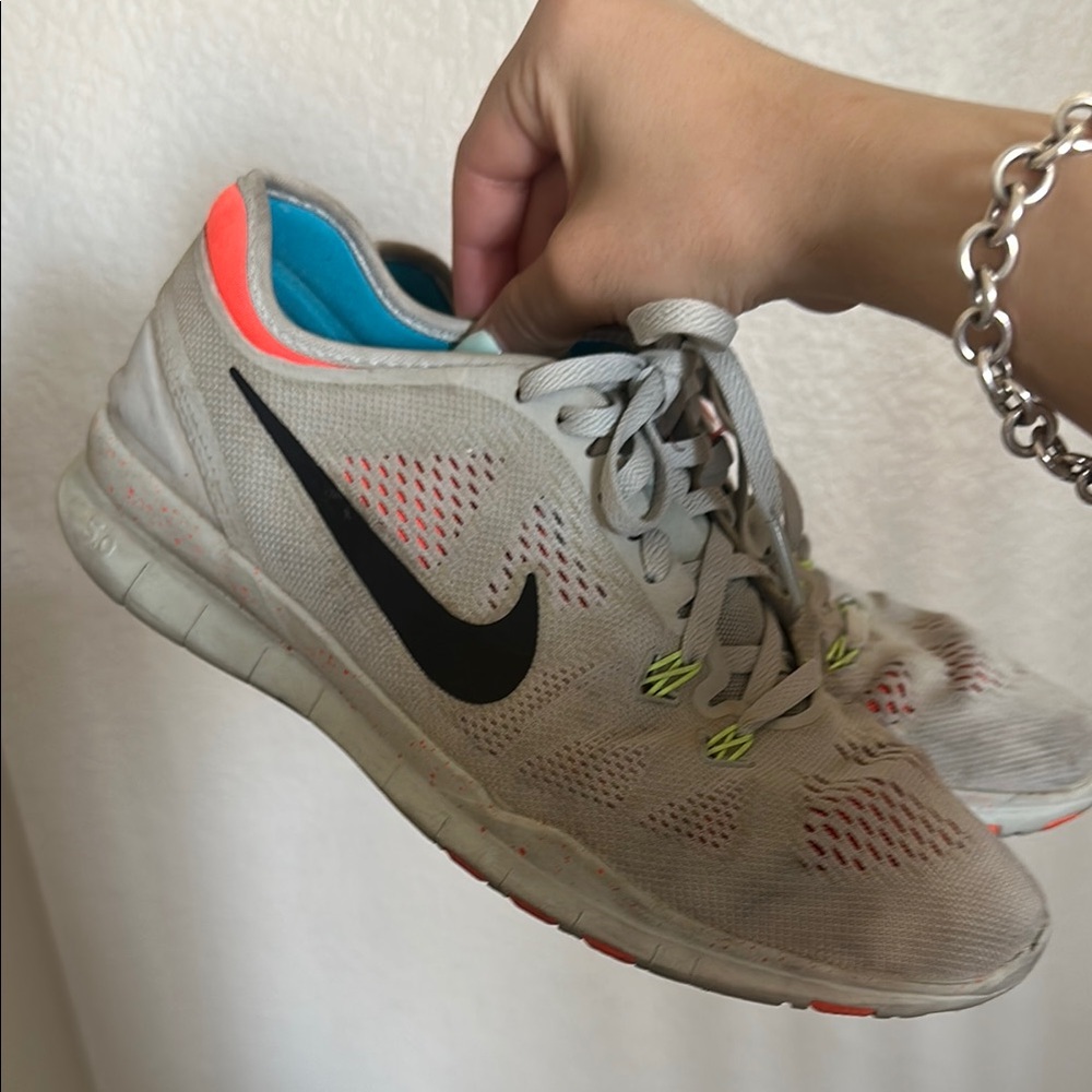 Nike Gray and Pink Athletic Shoes with Breathable Design